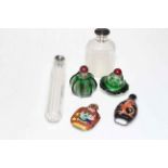 Four Chinese glass and enamel snuff bottles, and two silver topped toilet bottles (6).