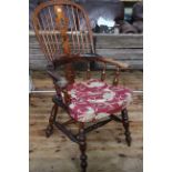 Antique Windsor pierced splat back broadarm chair.