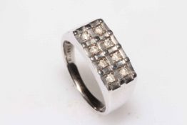 Gents eight stone diamond 9 carat white gold ring, size R.