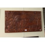 Haitian carved folk art hardwood panel, 36cm by 64cm.