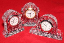 Three small Waterford boudoir clocks.