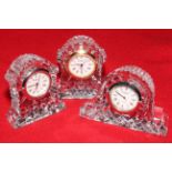 Three small Waterford boudoir clocks.