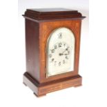 Edwardian inlaid mahogany mantel clock with silvered dial.