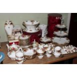 Royal Albert Country Roses including teapot, cakestand, etc, approximately 65 pieces.
