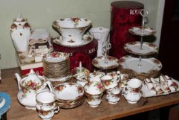 Royal Albert Country Roses including teapot, cakestand, etc, approximately 65 pieces.