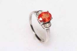 9k Orange Sapphire and diamond ring, size P.