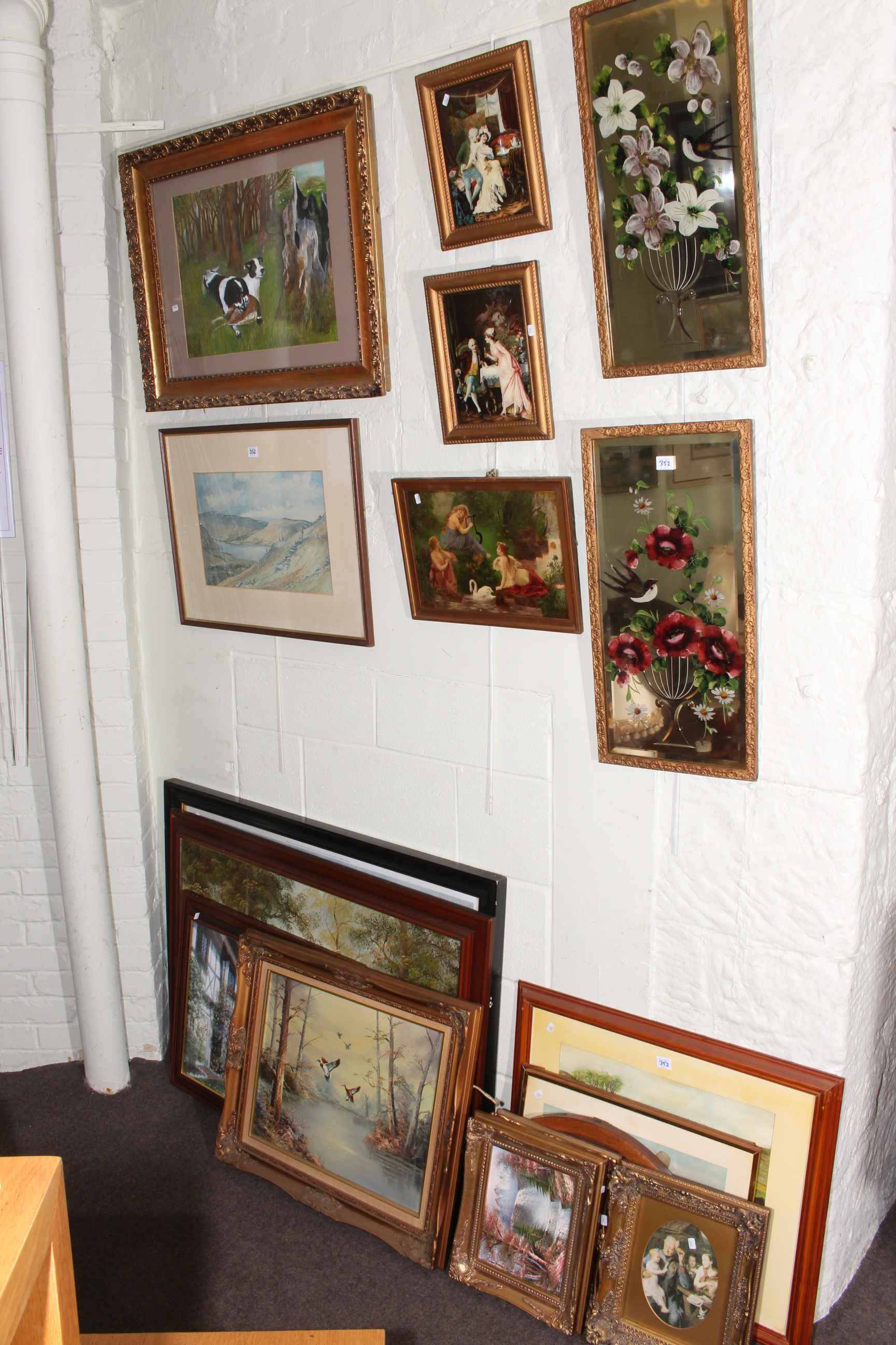 Collection of eighteen various pictures and mirrors including paintings on glass and painted