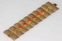 Gold on silver filigree panel bracelet with cabachon coral, 8.5cm length.