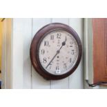 Circular wall clock, the dial initialled AM 1941.