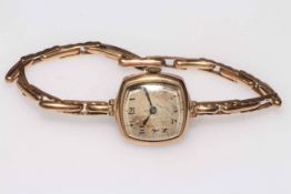 9 carat gold ladies bracelet watch.