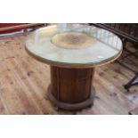 1930's circular mahogany cocktail table having central elevating compartment, 60cm by 76cm diameter.
