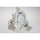 Lladro group of girl waking a sleeping shepherd, 27.5cm.