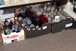 Three boxes of apothecary bottles and jars.