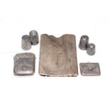 Victorian silver engraved vesta case, silver stamp holder, card case and four thimbles.