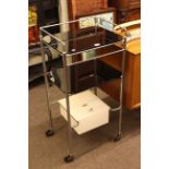 Vintage tinted glass and chrome medical/dental trolley.