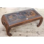 Oriental carved rectangular coffee table, 34cm by 87.5cm by 38cm.
