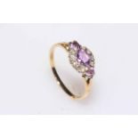Amethyst and diamond cluster 18 carat gold ring, size R.