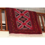 Hand knotted Persian Turkaman rug. 2.04 by 1.25.
