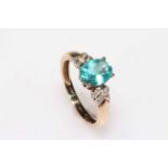 9k Apatite and diamond ring, size P.