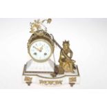 Gilt metal mounted marble mantel clock with cherub figure.