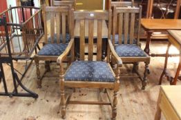 Oak barley twist drop leaf dining table and five chairs including one carver.