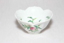 Small Chinese porcelain bowl with peach decoration, 12cm diameter.