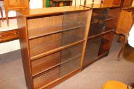 Two sliding glazed door bookcases.