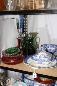 Blue and white pottery and coloured glass.