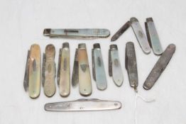 Collection of silver and mother of pearl fruit knives.