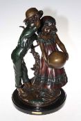 A large bronze group of children 'Whispering Children' on marble base stamped 'Moreau', 54cm high.