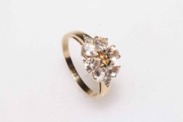 9 carat white six stone petal design cluster ring, size Q.