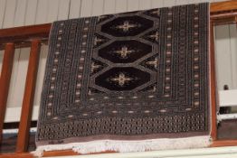 Bokhara rug 1.55 by 0.92.