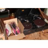 Two 'His Masters Voice' table top gramophones and records.