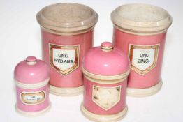 Set of 19th Century pink and white chemist jars.