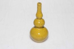 Chinese crackle glazed double gourd yellow vase, 12cm high.