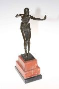 Bronze figure of semi-clad female dancer, 49cm high.