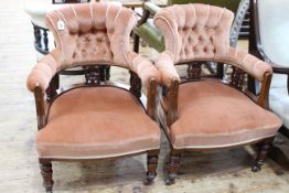 Pair Victorian walnut tub chairs on turned legs in buttoned draylon.
