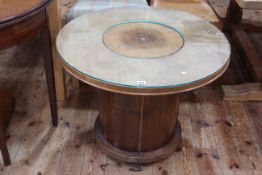 1930's circular mahogany cocktail table having central elevating compartment, 60cm by 76cm diameter.