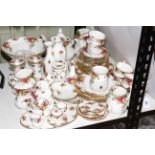 Royal Albert Old Country Roses including teapot, approximately 50 pieces.