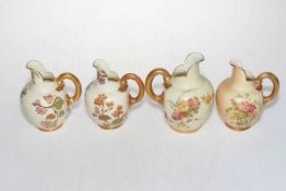 Four Royal Worcester jugs '1094'.