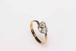 Diamond two stone platinum and 18 carat gold ring, total approximately 0.4 carat, size O.
