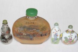 Four Oriental snuff bottles.