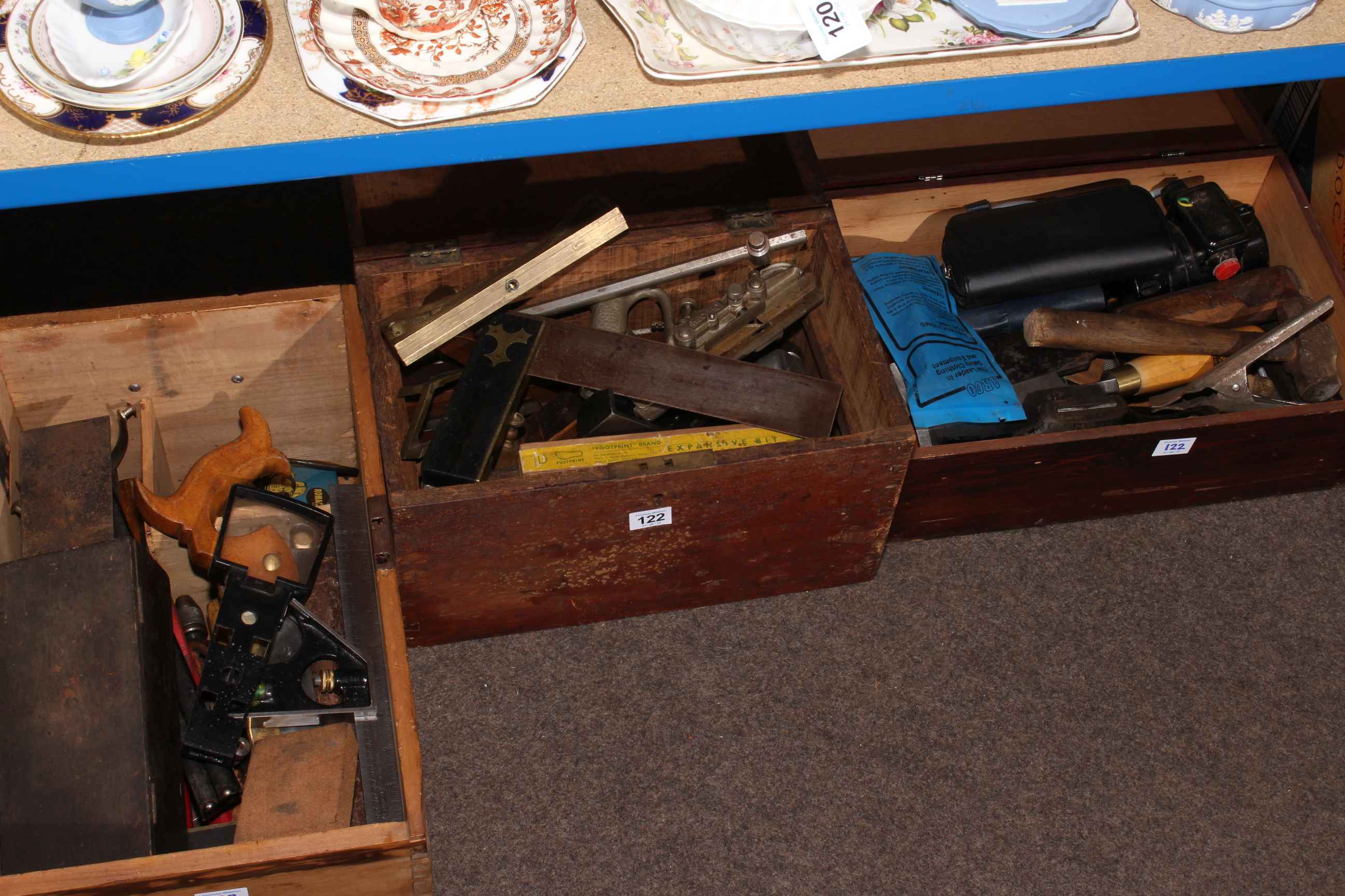 Three chest boxes of vintage tools including planes.