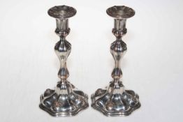 Pair of silver plated candlesticks.