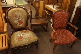 Georgian oak pierced splat back elbow chair,