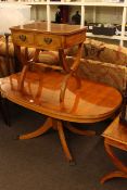 Oval yew low centre table, rectangular yew low table and yew two drawer side table (3).