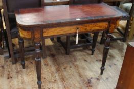 Victorian mahogany and rosewood fold top tea table having frieze drawer and raised on tapering