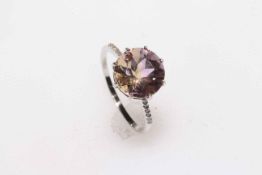 4 carat brilliant cut spinel ring set in 9 carat white gold, size N.
