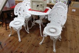 White painted circular aluminium patio table and four chairs (table 69cm by 69cm diameter).