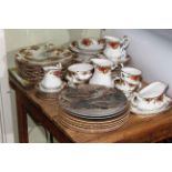 Royal Albert Old Country Roses, approximately fifty eight pieces, and collectors plates.
